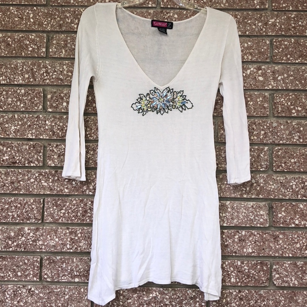Say What? White tunic with bedazzled front
